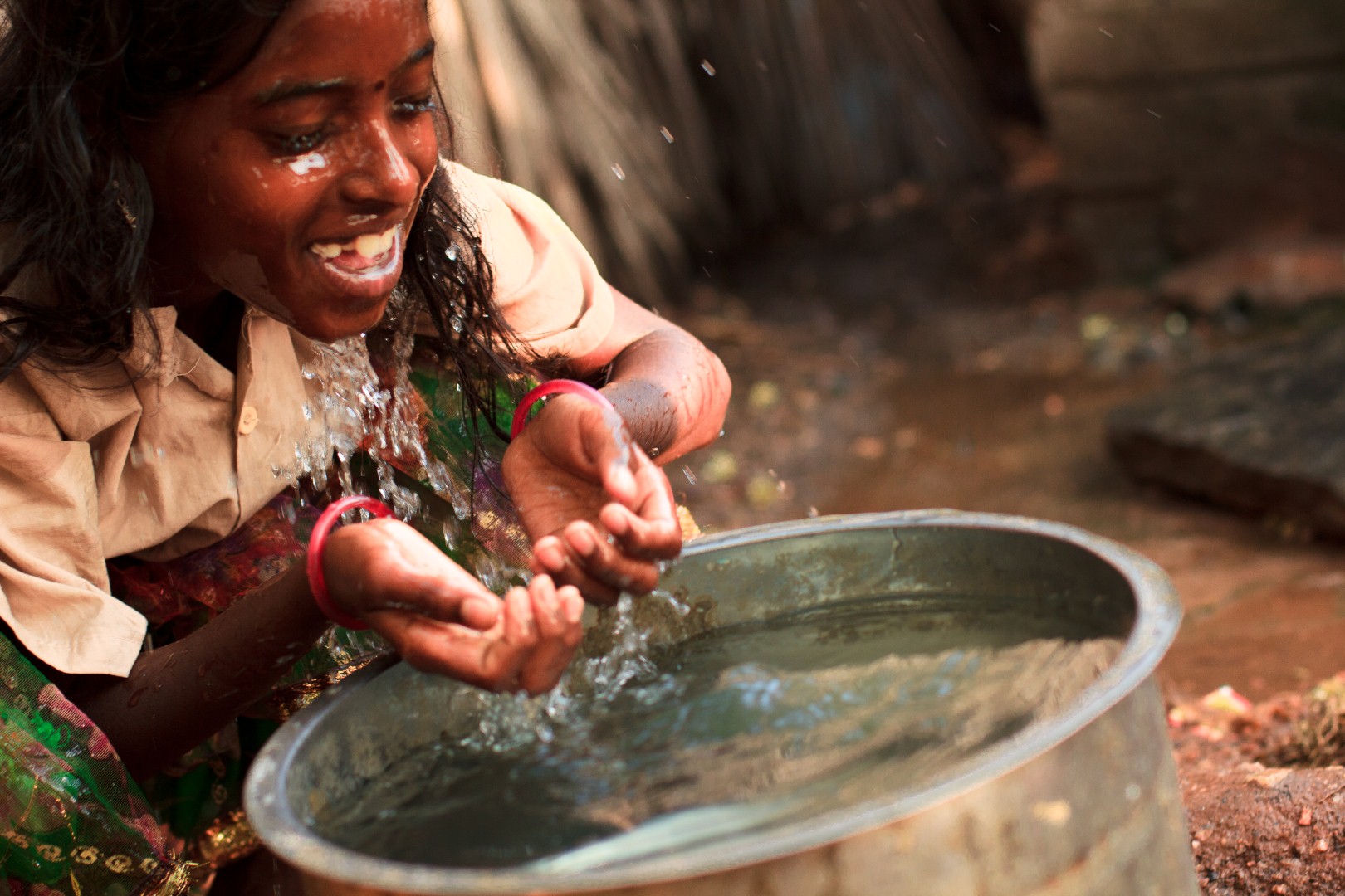 Water in the hands of a farmer
